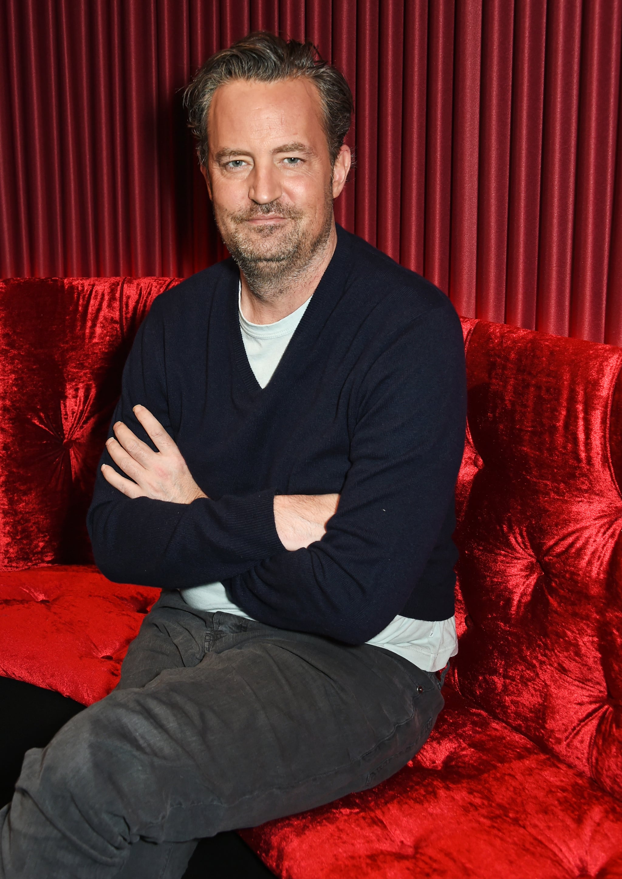 LONDON, ENGLAND - FEBRUARY 08: Matthew Perry poses at a photocall for 