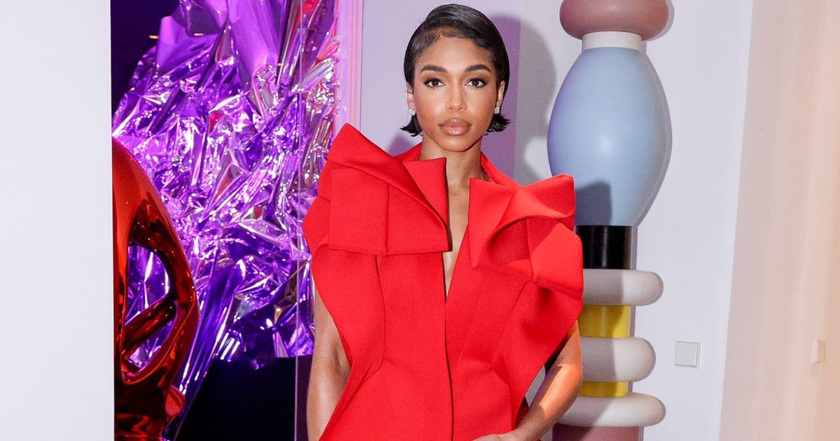 Lori Harvey Wears a Plunging Red Dress With a Front Slit and Open Back