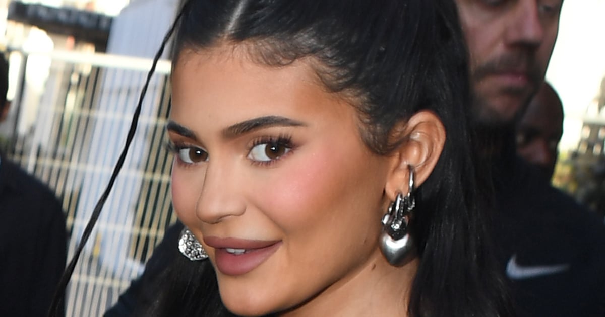 Kylie Jenner Wears a Plunging Neckline and Thigh-High Slit on Christmas Eve